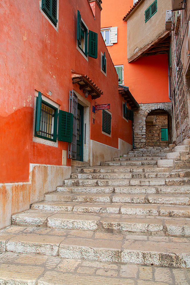 Walkway steps up to Arch, Old Town, Rovinj, Croatia, Europe