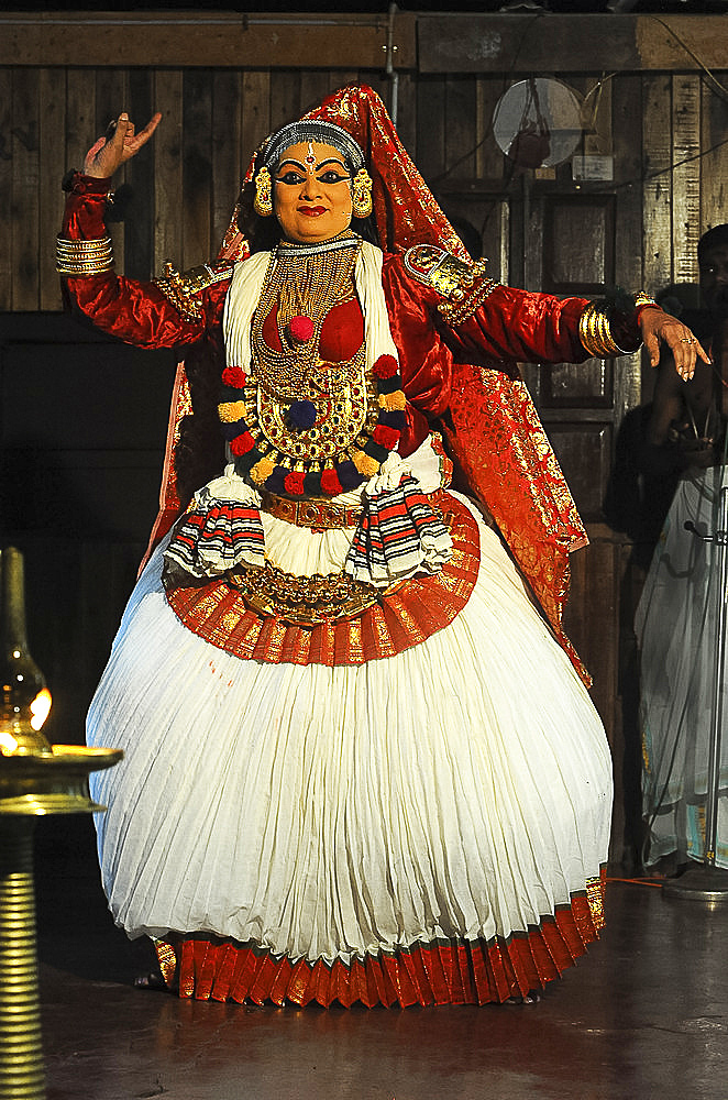 Contemporary female performer in a traditional Kathakali dance about folk mythologies from the Hindu epics, Nilambur, Kerala, India, Asia