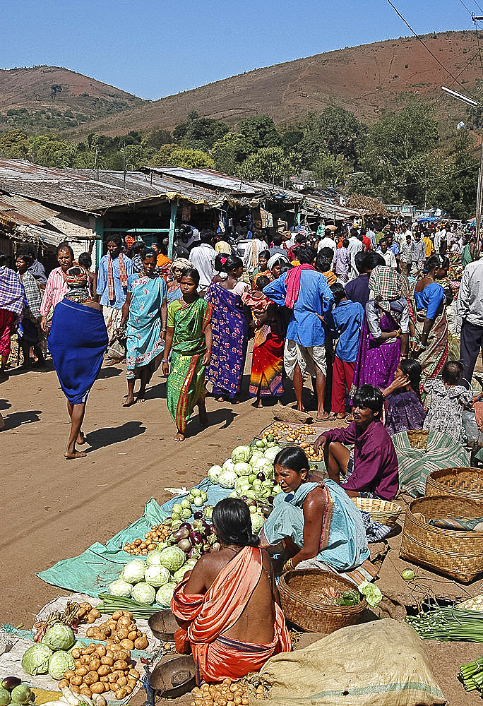 Bonda tribeswomen come down from the hills to sell vegetables in the weekly market in Onukudelli, Orissa, India, Asia