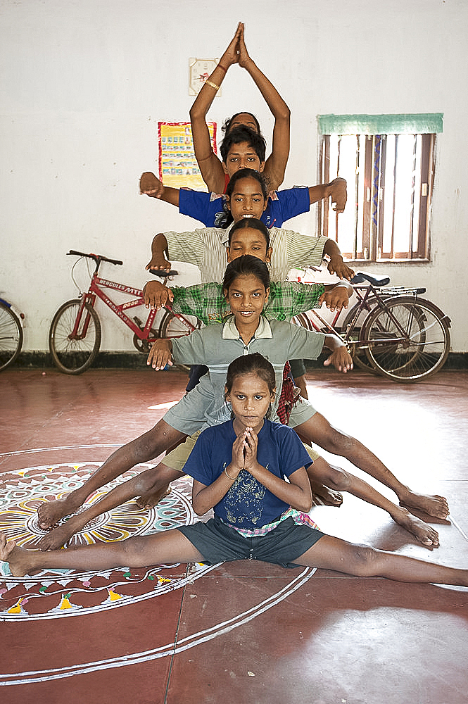 Young boys being trained as female Gotipua dancers performing in praise of Lord Jagannath and Lord Krishna, Raghurajpur, Orissa, India, Asia