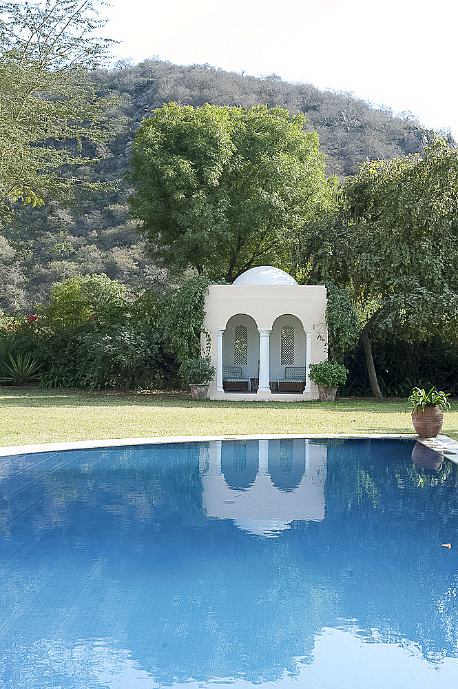 Arched Moghul folly in a quiet garden, Haryana, India, Asia