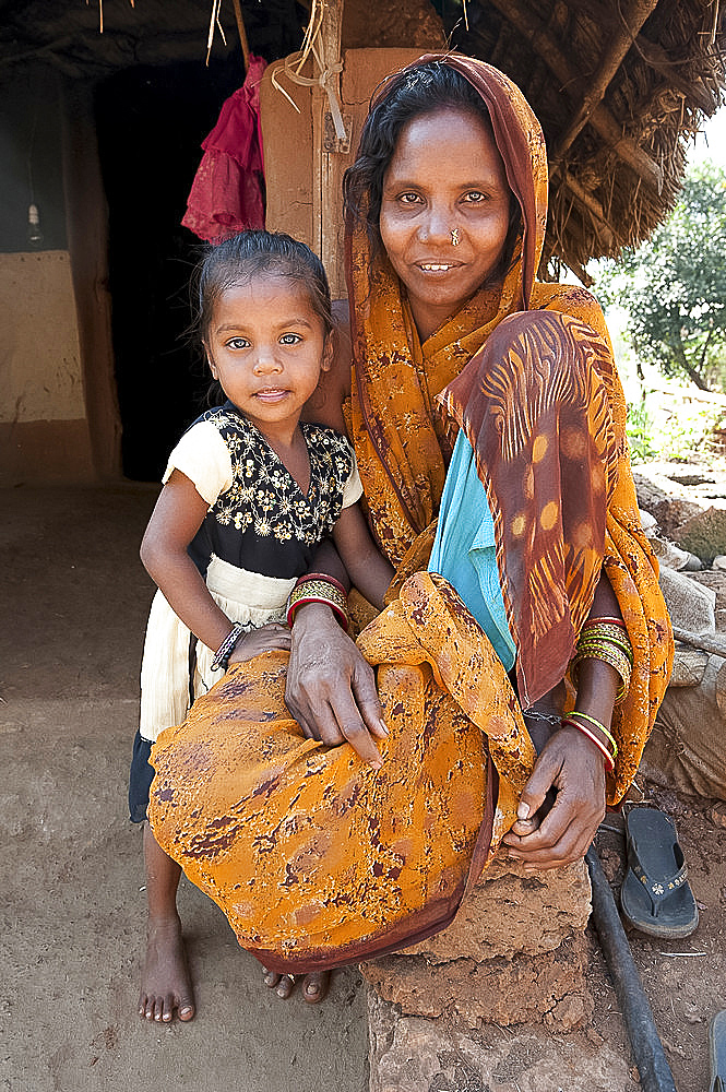 Mother and daughter, family of untouchable brass Dokhra worker in rural village, Orissa, India, Asia