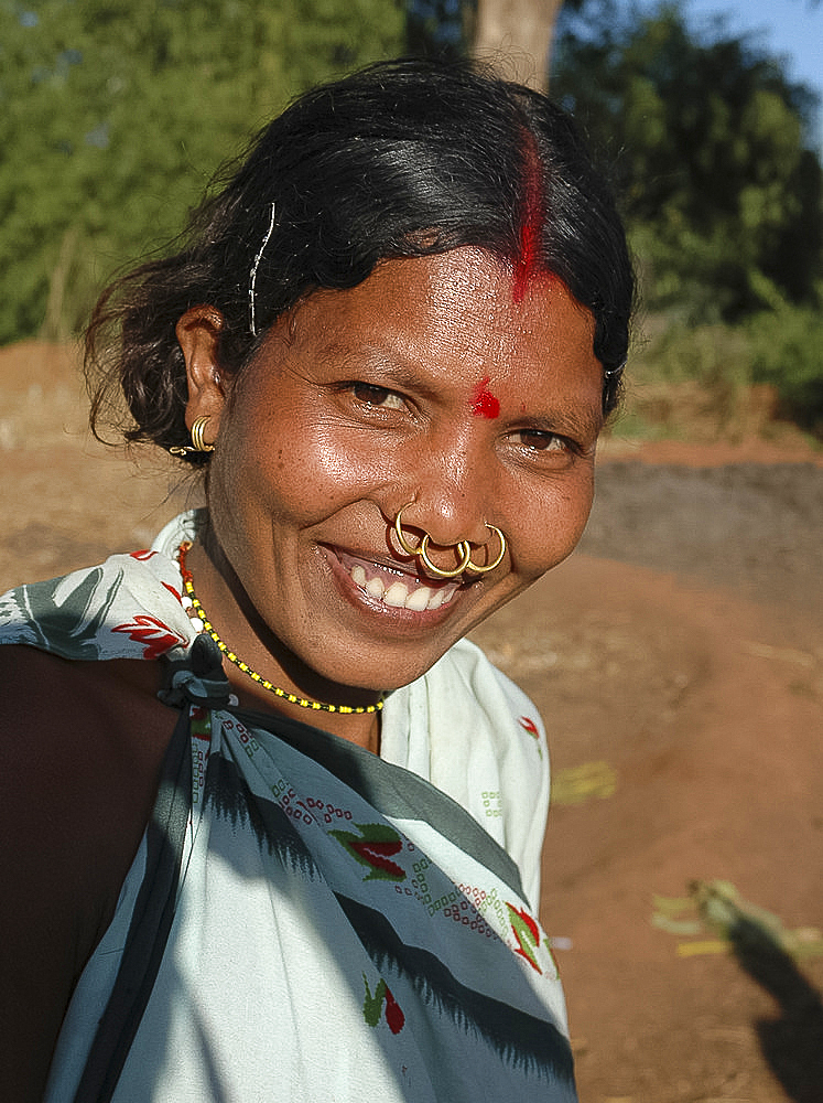 Smiling Dongoria Kondh married woman, with tribal nose rings, Kuvi Kondh village, Orissa, India, Asia