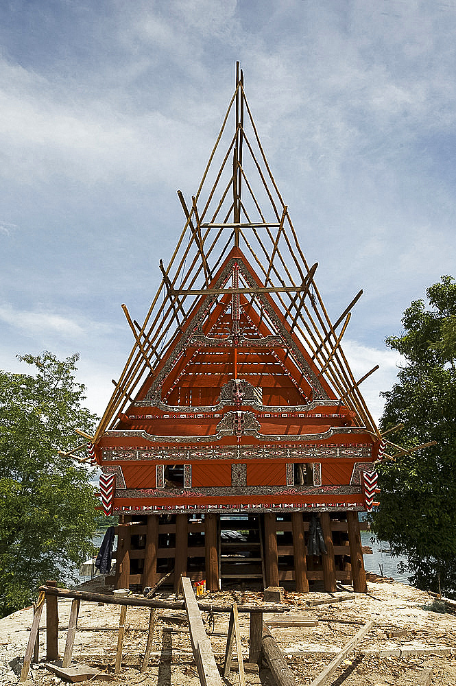 Construction of traditional style Batak house with bamboo scaffolding, beside the volcanic Lake Toba, Samosir Island, Sumatra, Indonesia, Southeast Asia, Asia