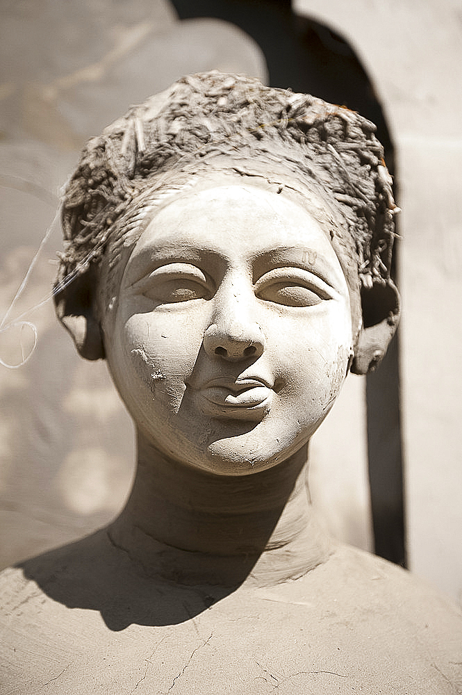 Detail of Durga puja deity made friom river mud and straw for Durga Puja celebrations, Guwahati, Assam, India, Asia