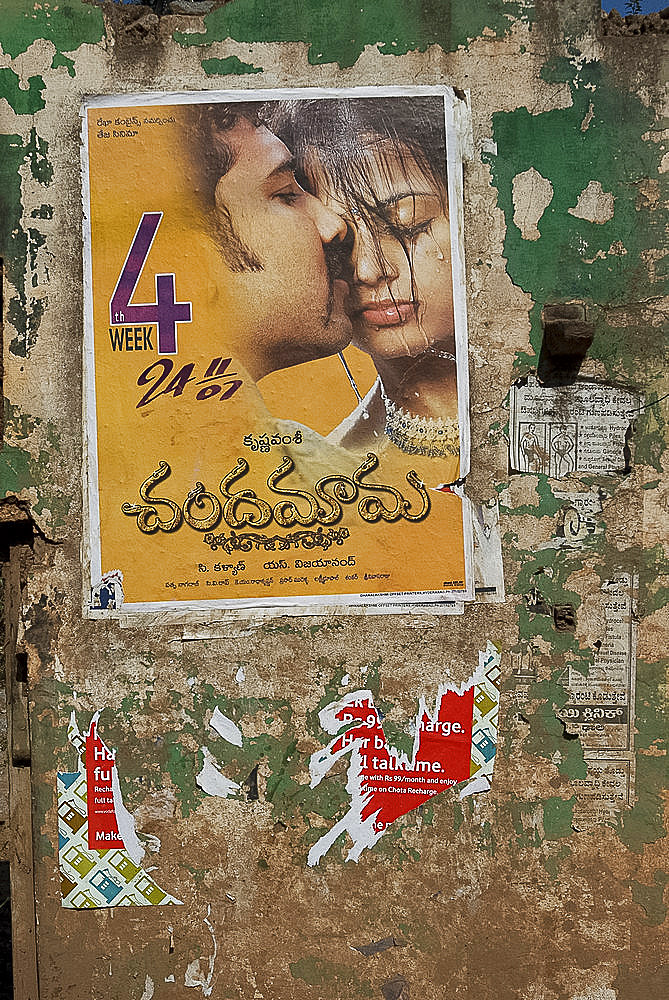 Bollywood movie poster on wall, Hospet, Karnataka, India, Asia