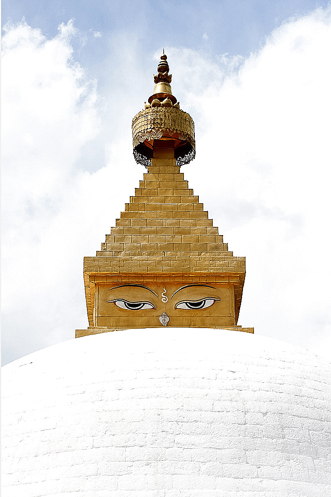 Buddha's eyes on stupa in the grounds of Khamsum Yulley Namgyal, consecrated in 1999, Punakha, Western Bhutan, Asia