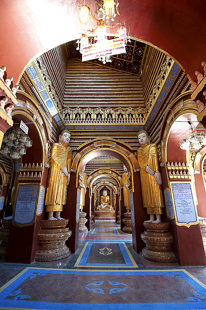 Interior of Thanboddhay Pagoda, showing some of the 100000 Buddhas there, large and small on shelves, Monywa, Sagaing Division, Myanmar (Burma), Asia