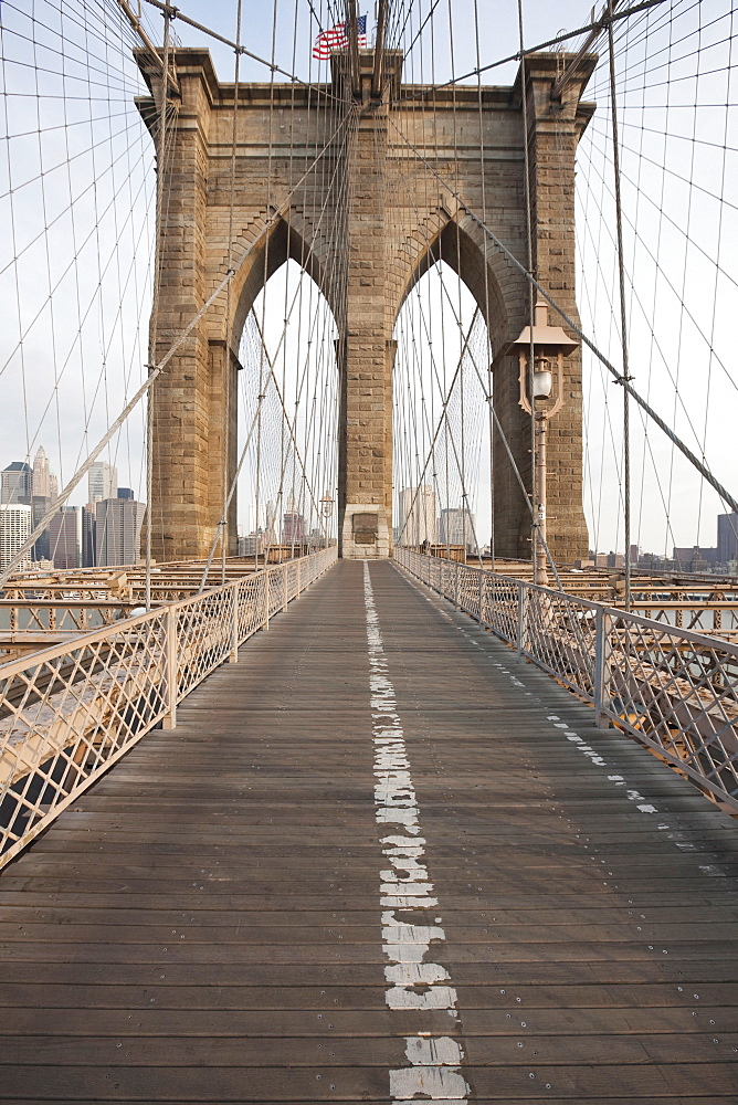 Early morning on Brooklyn Bridge, New York City, New York, United States of America, North America