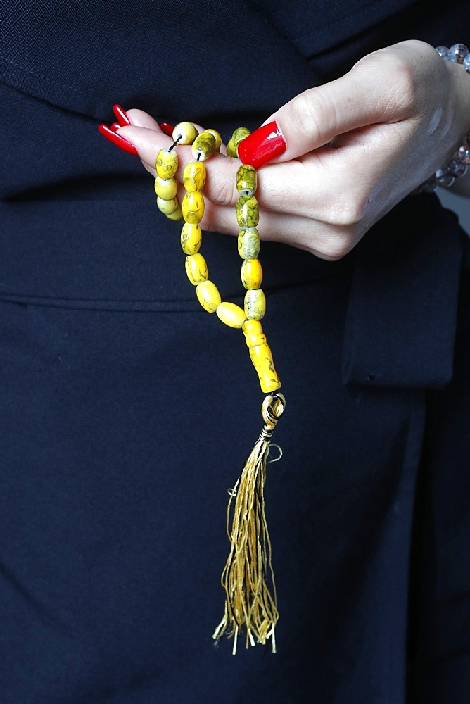 Close-up of Muslim woman holding Islamic prayer beads, Vietnam, Indochina, Southeast Asia, Asia