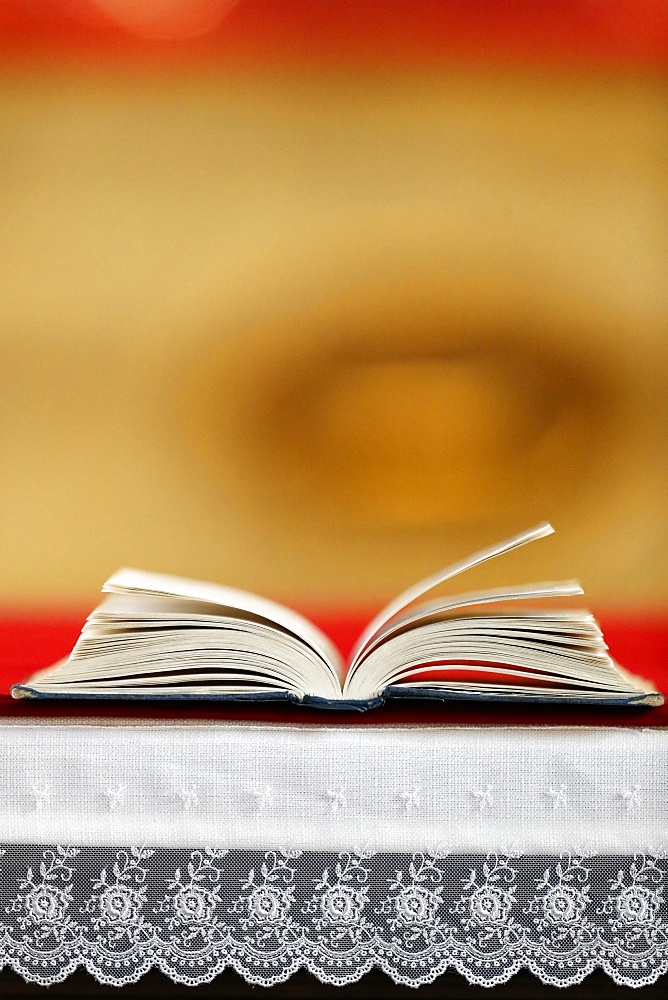 Open Bible on altar, Haute-Savoie, France, Europe