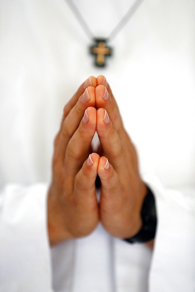 Close up of Monk's hands praying in church, Cistercian Abbey, Our Lady of My Ca, Vietnam, Indochina, Southeast Asia, Asia