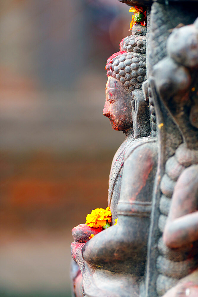 Buddha statue, Buddhist shrine in the street, Kathmandu, Nepal, Asia