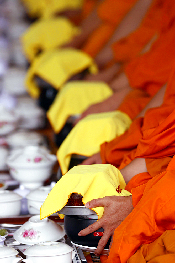 Vegetarian meal, monks at Buddhist ceremony in the main hall, Phuoc Hue Buddhist pagoda, Tan Chau, Vietnam, Indochina, Southeast Asia, Asia