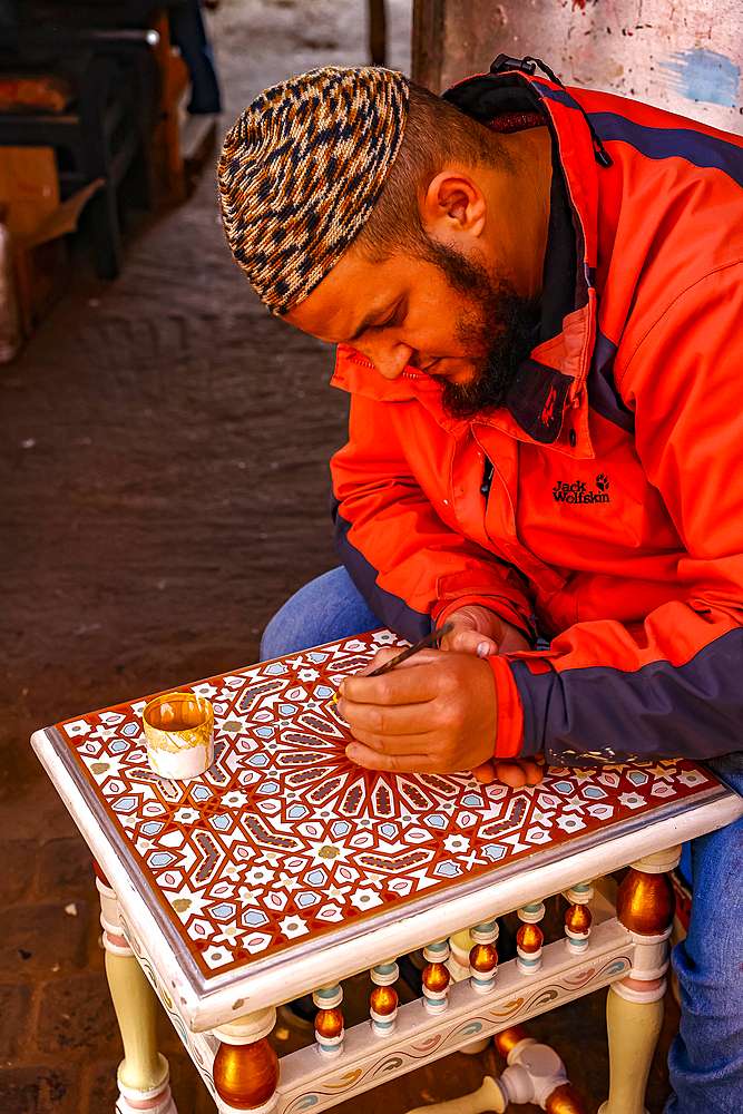 Craftsman at work in a workshop in Marrakesh, Morocco