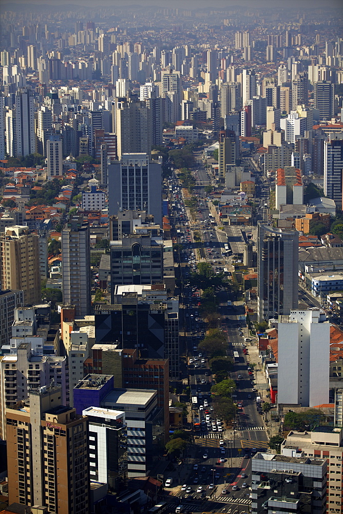 View over Sao Paulo skyscrapers and traffic jam from taxi helicopter, Sao Paulo, Brazil, South America