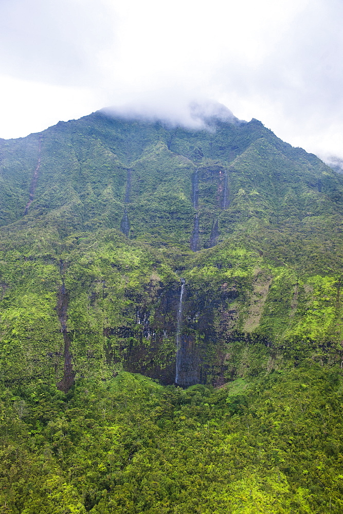 Aerial of a waterfall in the interior of Kauai, Hawaii, United States of America, Pacific