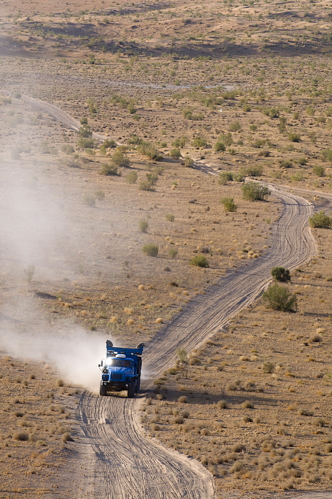 Off-road driving over dusty country road, Karakol desert, Turkmenistan, Central Asia, Asia