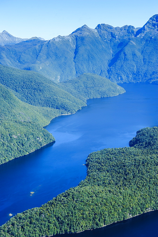 Aerial of a huge fjord in Fiordland National Park, UNESCO World Heritage Site, South Island, New Zealand, Pacific