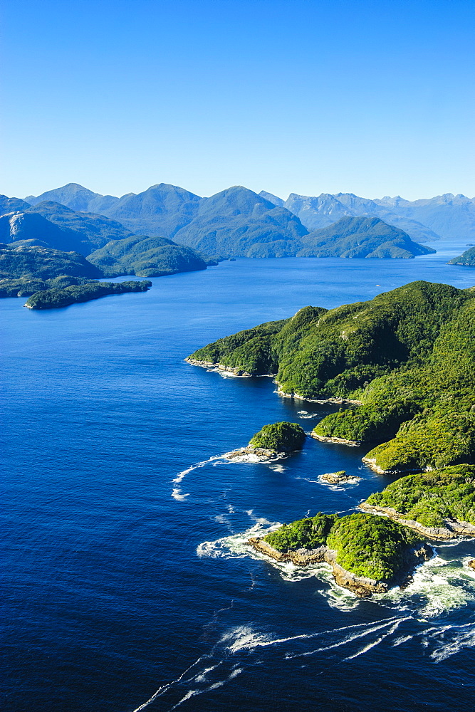 Aerial of a huge fjord in Fiordland National Park, UNESCO World Heritage Site, South Island, New Zealand, Pacific