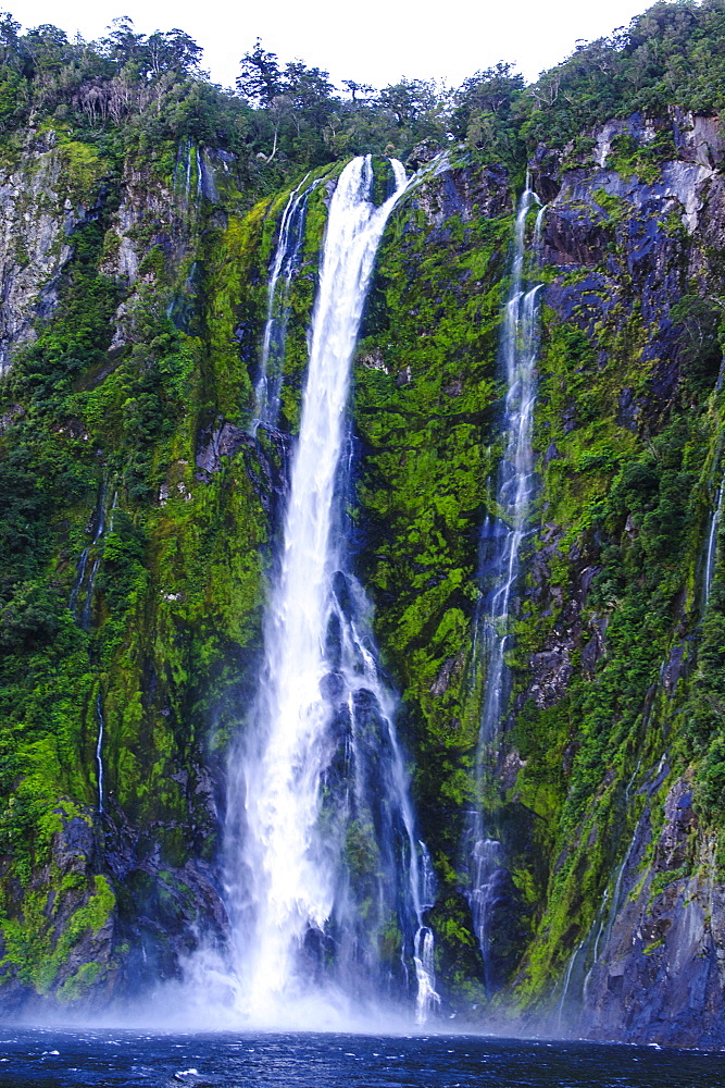 Huge waterfall in Milford Sound, Fiordland National Park, UNESCO World Heritage Site, South Island, New Zealand, Pacific