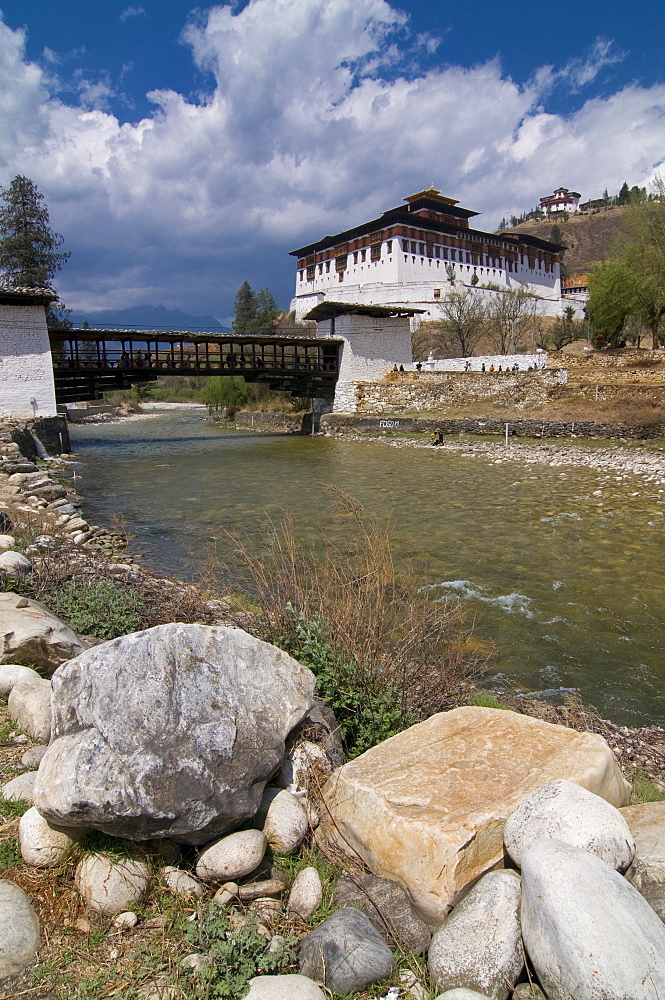 The Paro Tsong (a old castle) and a wooden covered bridge, Paro, Bhutan, Asia