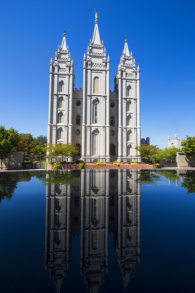 Mormon Salt Lake Temple reflecting in a little pond, Salt Lake City, Utah, United States of America, North America