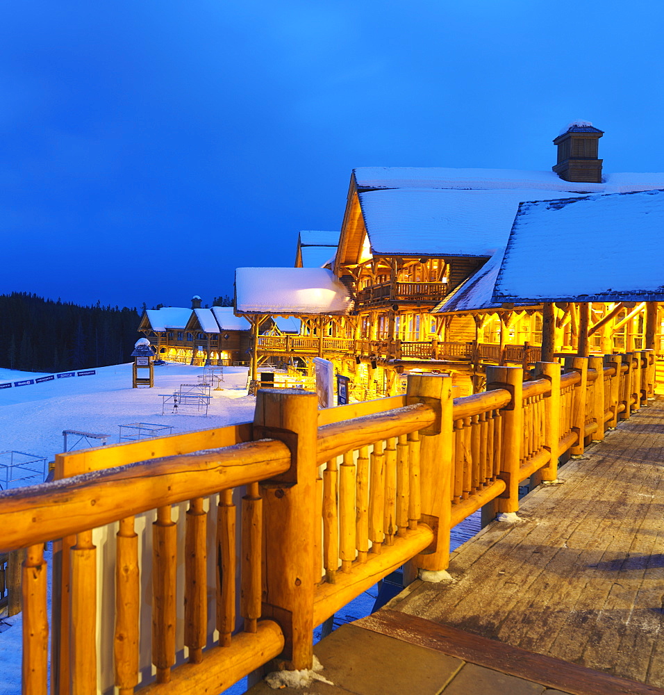 Wiskeyjack Ski Lodge in winter at dusk, Lake Louise, Banff National Park, Alberta, Canada, North America