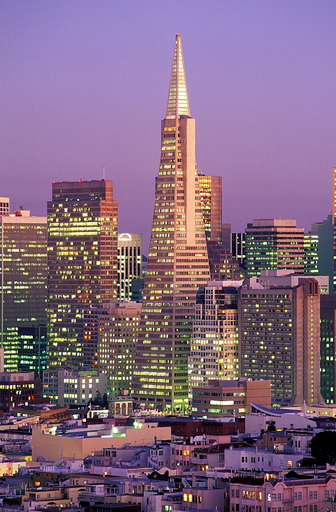 View of city skyline with TransAmerica Building at dusk, San Francisco, California, United States of America, North America