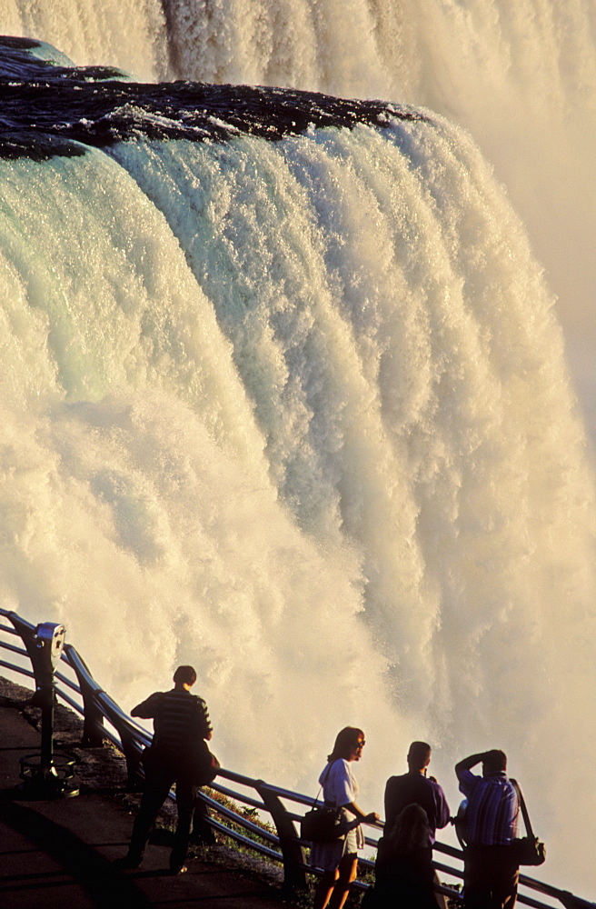 Tourists on the brink of American Falls, Niagara Falls, New York State, United States of America, North America