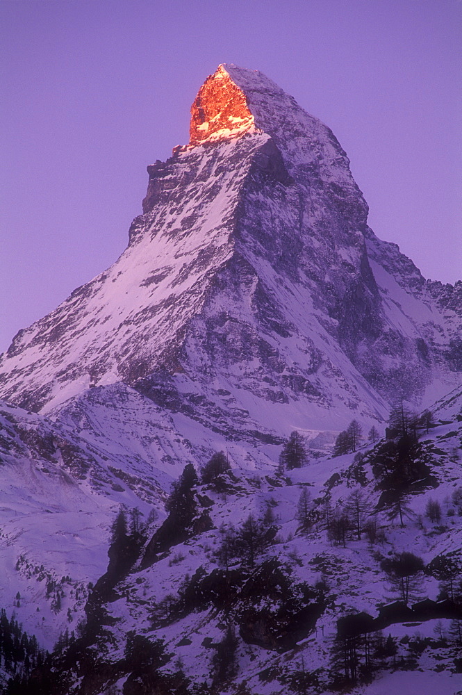 Matterhorn illuminated at sunrise, Zermatt, Valais, Switzerland, Europe