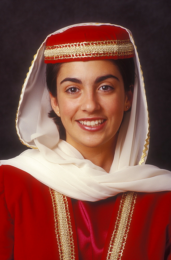 Portrait of teenager dressed in traditional special occasion dress of Armenian heritage, Armenia, Central Asia, Asia