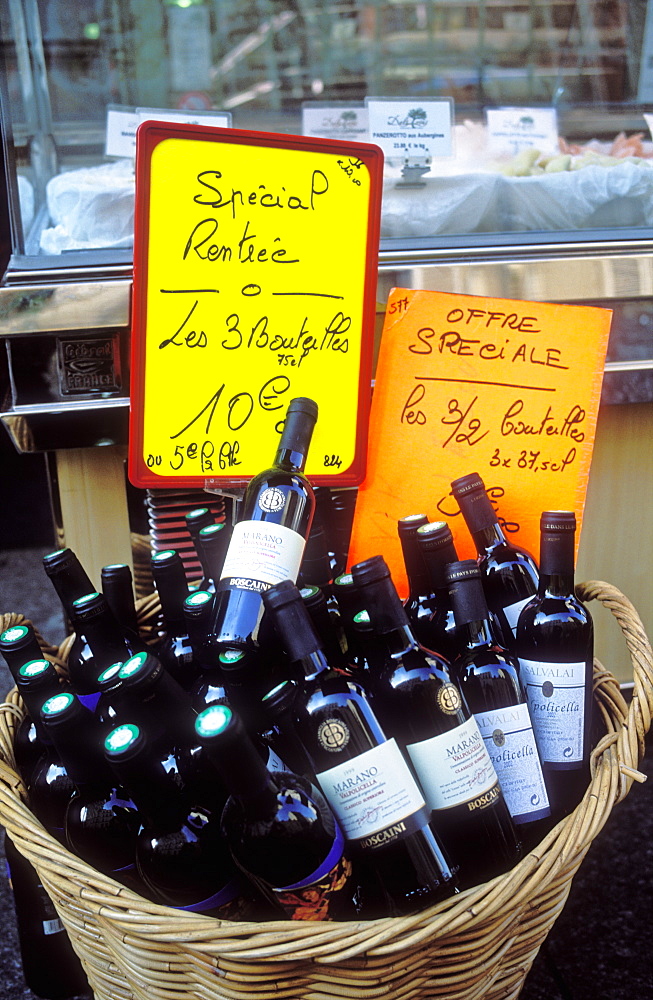 Wine on display for sale on Rue Cler, Paris, France, Europe