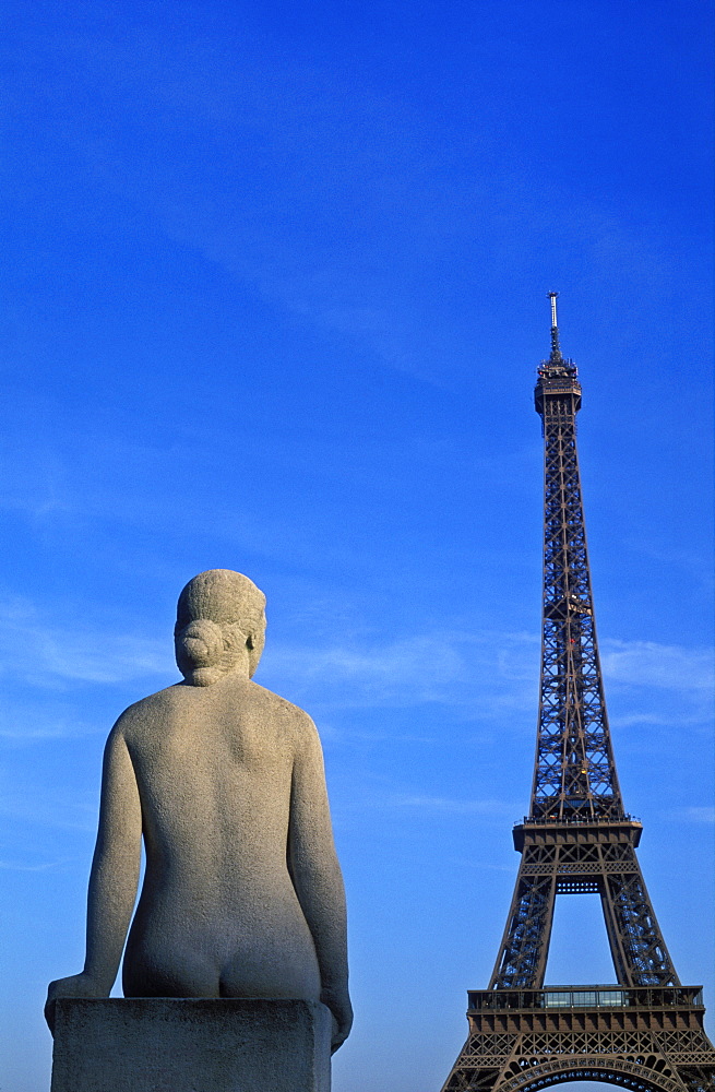 Statue of woman at the Trocadero facing the Eiffel Tower, Paris, France, Europe