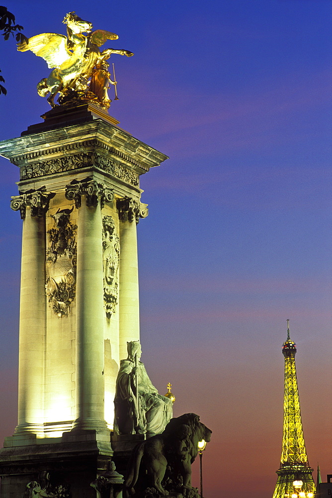 Pont Alexandre III and the Eiffel Tower illuminated at night, Paris, France, Europe