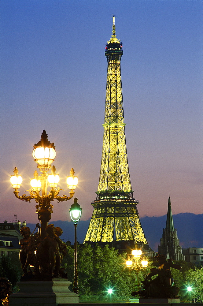 The Eiffel Tower illuminated at night, Paris, France, Europe