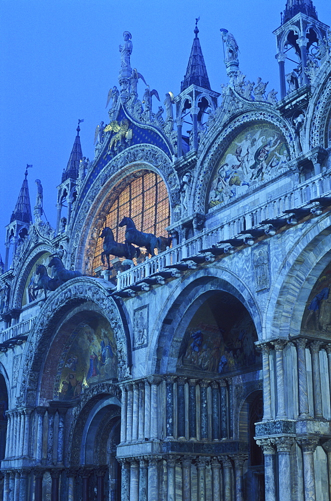 Facade of Basilica San Marco illuminated at dawn, Piazza San Marco, Venice, UNESCO World Heritage Site, Veneto, Italy, Europe