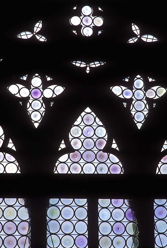 Detail of ornate windows with stained Venetian glass in the Doge's Palace (Palazzo Ducale), Venice, UNESCO World Heritage Site, Veneto, Italy, Europe