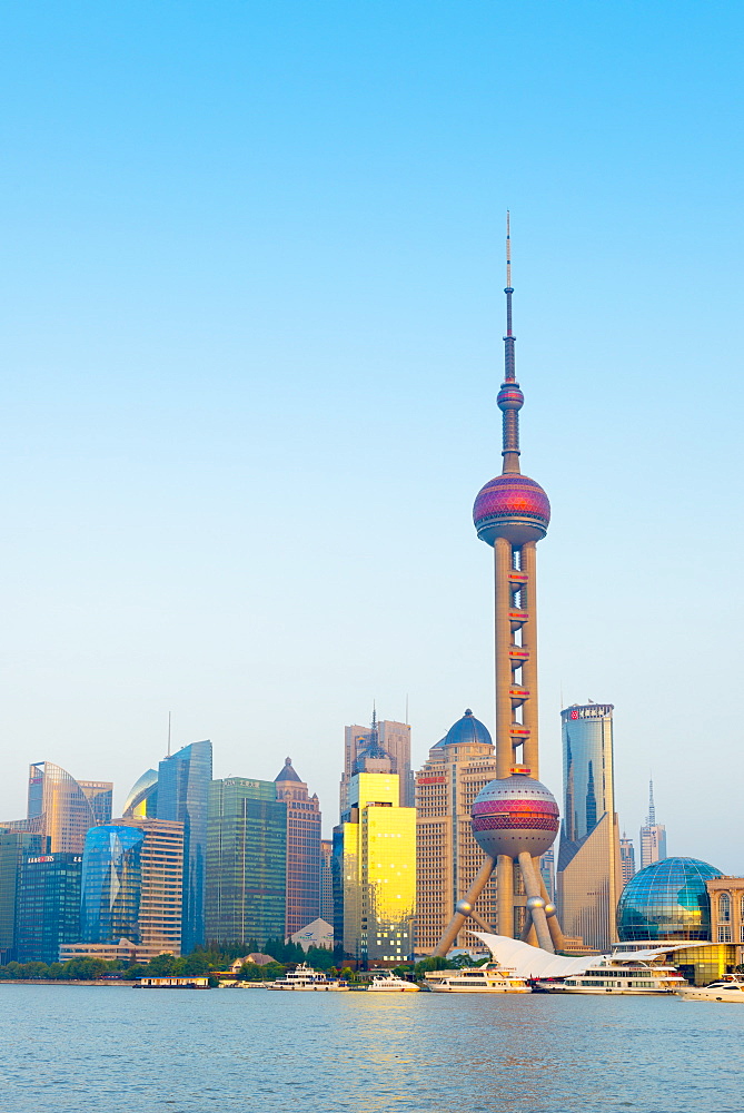 Skyline of Pudong Financial District including Oriental Pearl Tower, across Huangpu River, Shanghai, China, Asia 