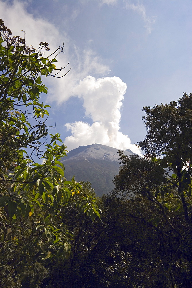 Smoke rises from the active crater of Tungurahua Volcano that threatens the nearby resort town of Banos, Ambato Province, Central Highlands, Ecuador, South America