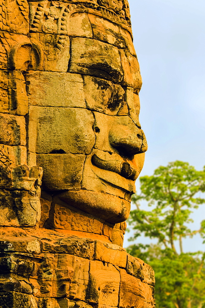 One of 216 smiling sandstone faces at 12th century Bayon, King Jayavarman VII's last temple in Angkor Thom, Angkor, UNESCO World Heritage Site, Siem Reap, Cambodia, Indochina, Southeast Asia, Asia