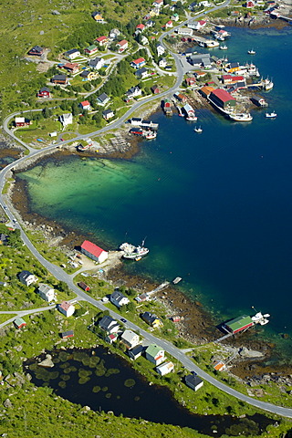 View on Reine with road houses and boats from above Moskenesoya Lofoten Norway