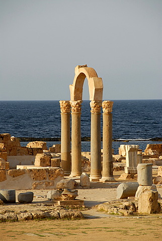 Pillars and arch at sea Sabratha Libya