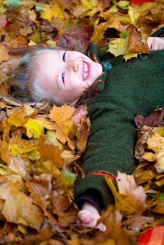 Girl, 7, in a park in autumn