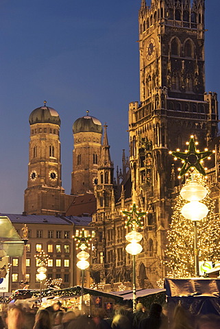 Christmas market on Marien-Place Munich with Marien-clumn townhall and cathedral Bavaria Germany