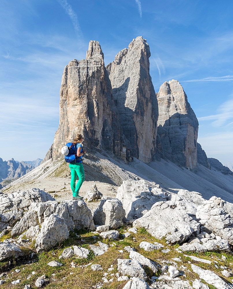 Hiker at the saddle of the Paternsattel, North faces of the Three Peaks, Sesto Dolomites, South Tyrol, Trentino-South Tyrol, Alto-Adige, Italy, Europe