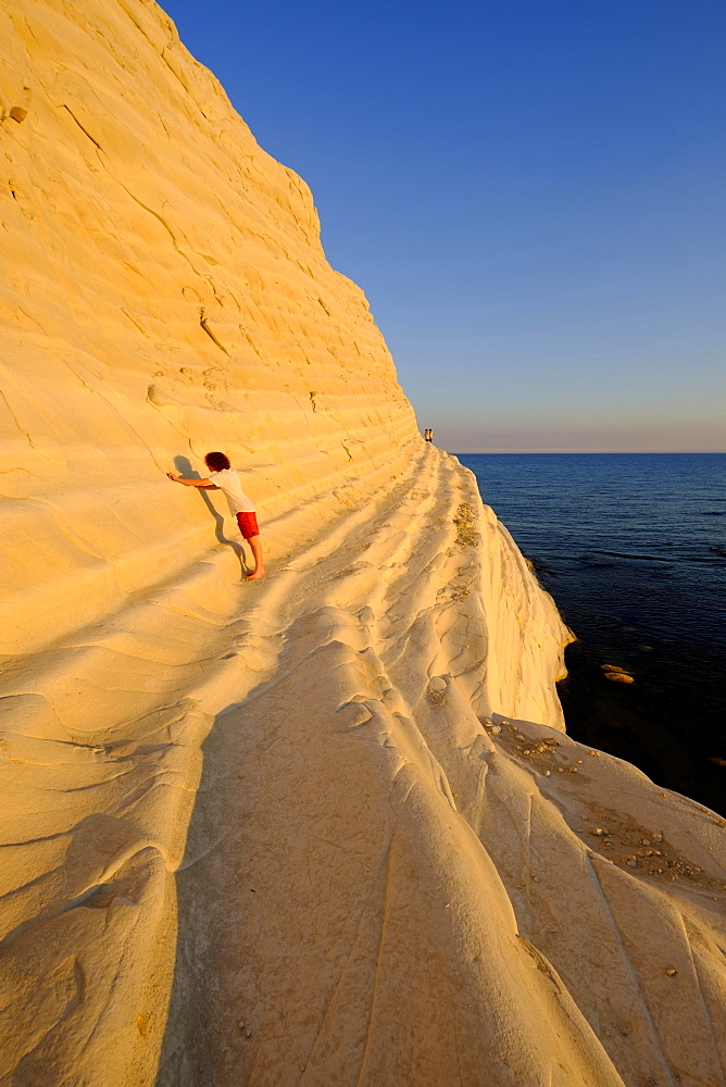 Sunset, rocky coast of Scala dei Turchi, limestone rocks, Realmonte, Province of Agrigento, Sicily, Italy, Europe