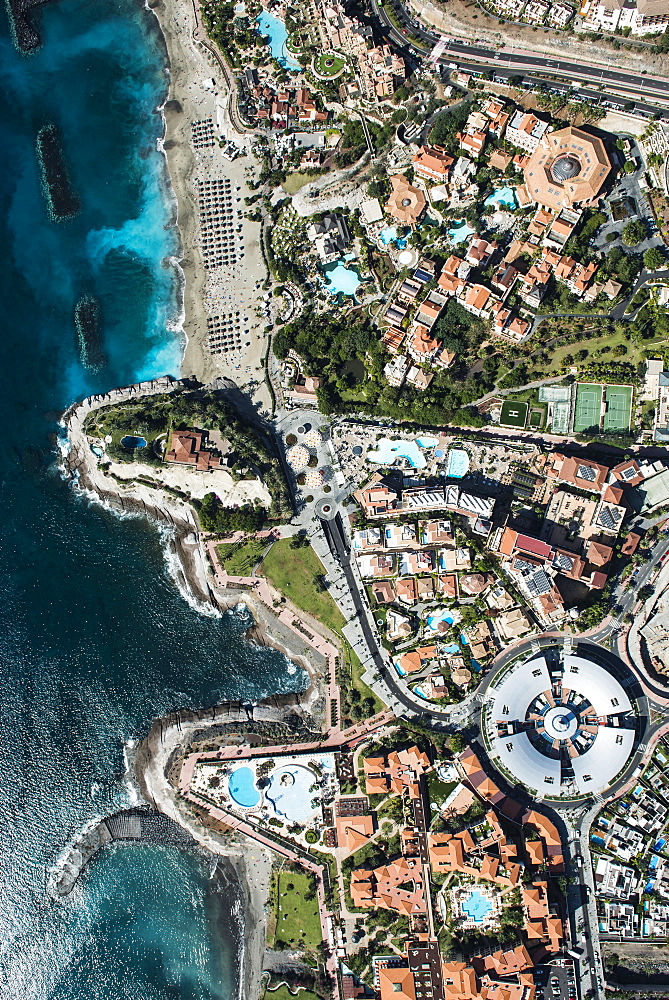 Seaside resort with beach and promenade by the sea, Playa del Duque, townscape with hotels and shopping malls, tourist area, south coast, Costa Adeje, Tenerife, Spain, Europe