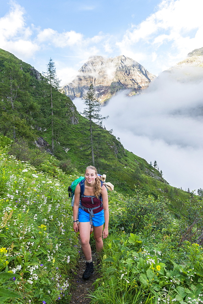 Hiker on path, Rohrmoos-Untertal, Schladminger Tauern, Schladming, Styria, Austria, Europe