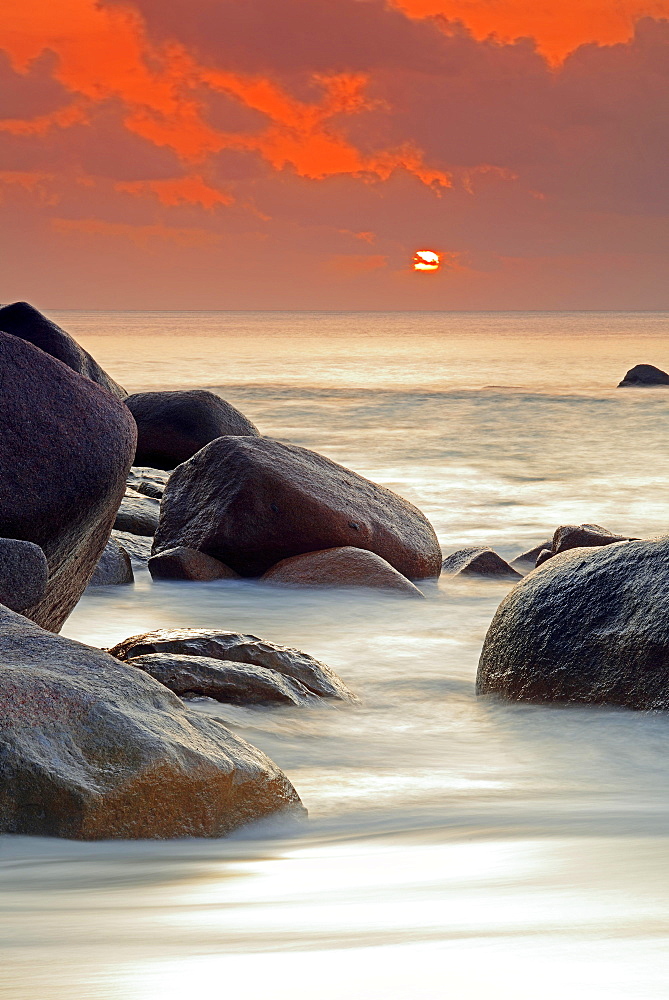 Spectacular sunset at Anse Lazio, long exposure, Praslin Island, Seychelles, Africa